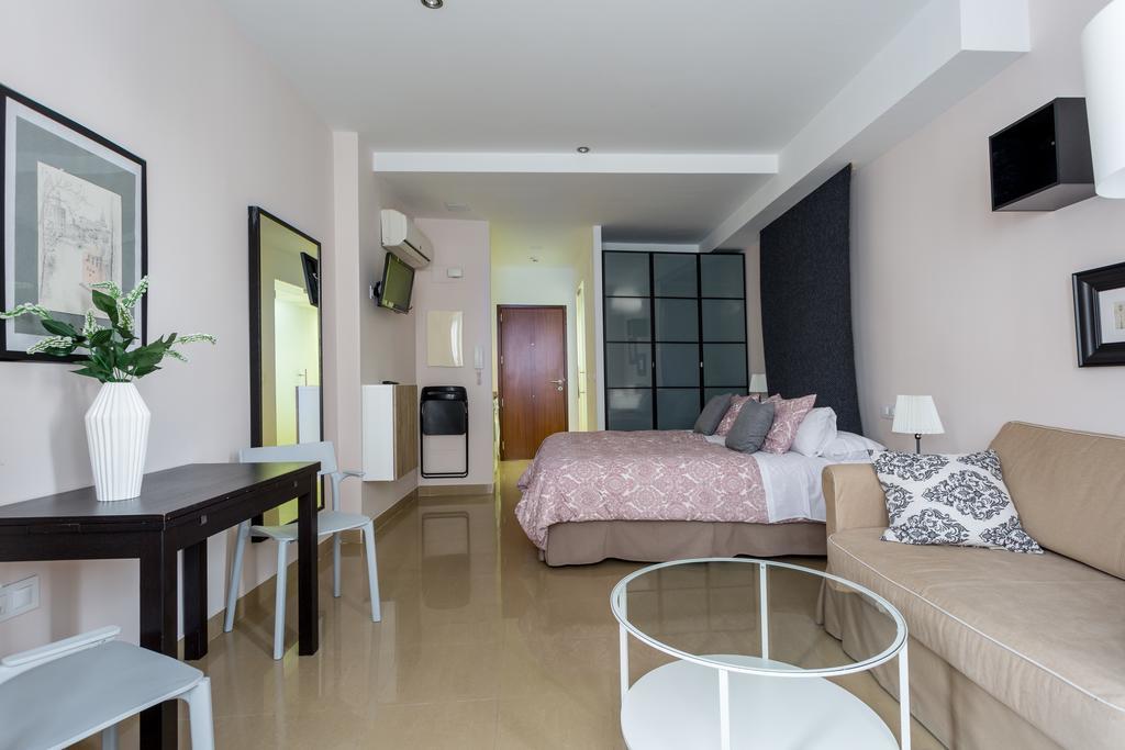 Apartamentos Edificio Constitucion เซบีญา ภายนอก รูปภาพ